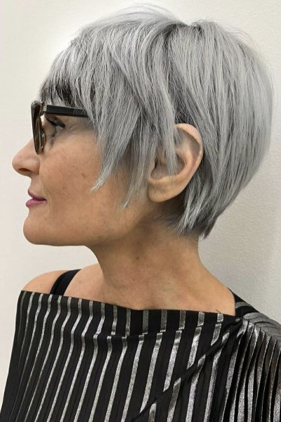Image of Crisp pixie cut for oval face with glasses