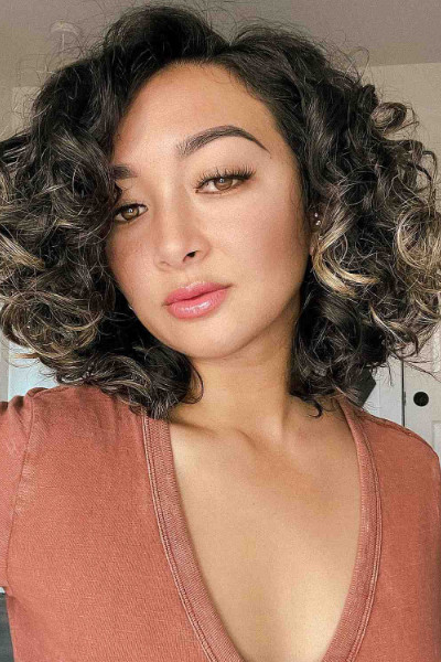 Short Curly Bob with a Side Part
